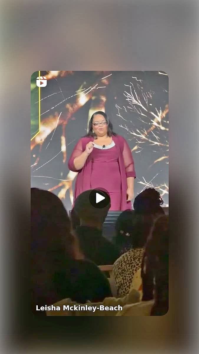 Leisha speaking on stage at USCHA 2026.